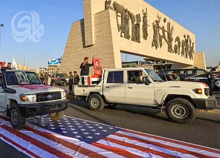 معتقلو حادثة العلم الأميركي بين 8 و10 أشخاص.. ووثائق متداولة تظهر انتساب بعضهم إلى الحشد
